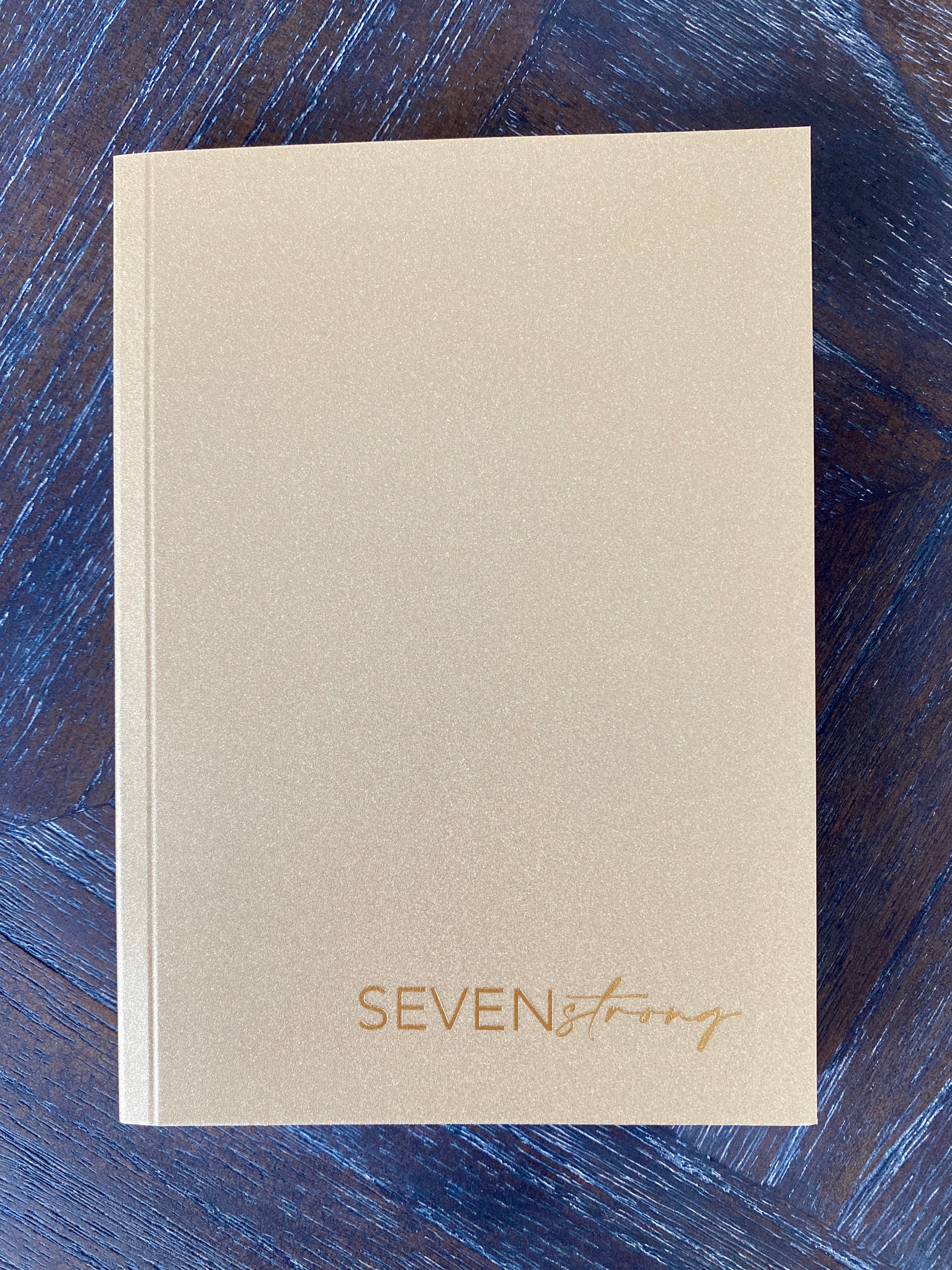 Gold Notebook – Seven Strong